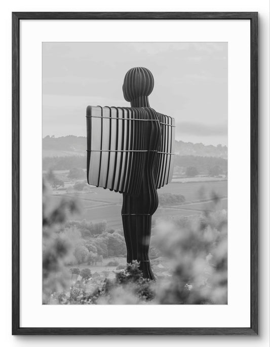 The Angel of the North Up Close - Gateshead - Black and White shown as a framed photographic print.