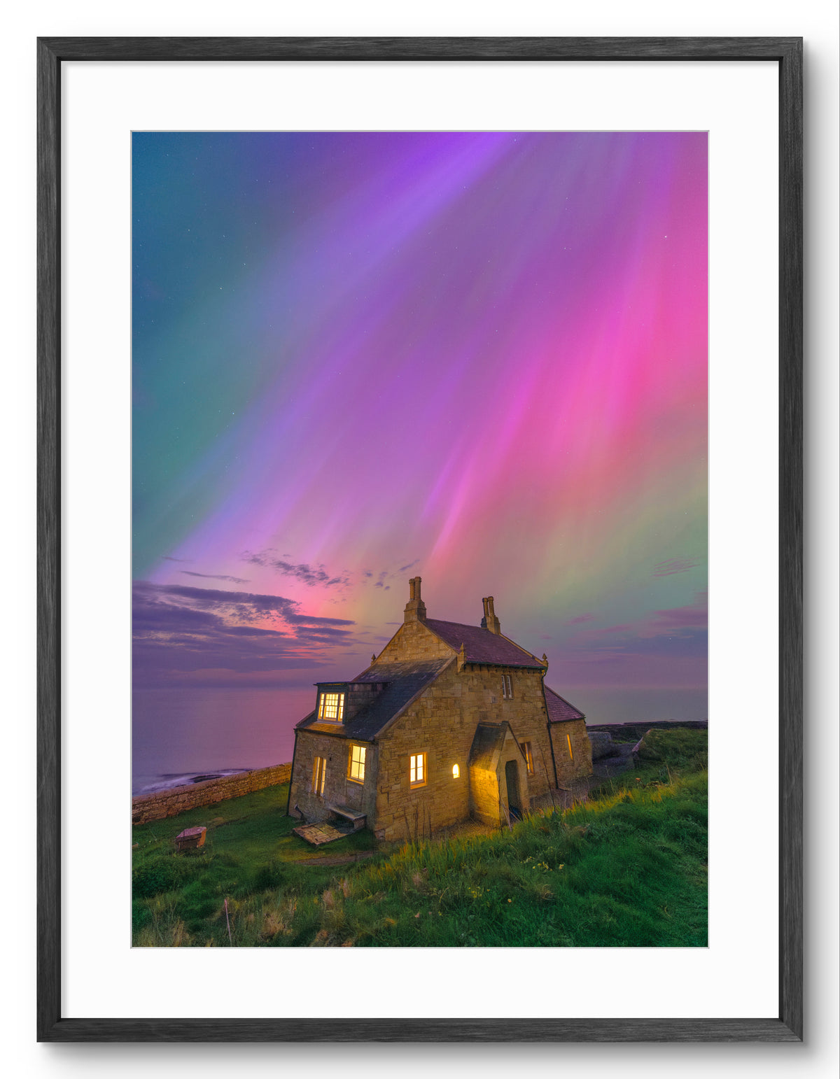 The Bathing House - Northern Lights - Craster - Northumberland shown as a framed photographic print.