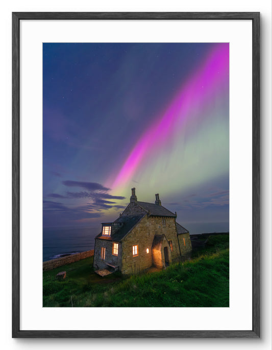 The Bathing House - Aurora Borealis - Craster - Northumberland shown as a framed photographic print.
