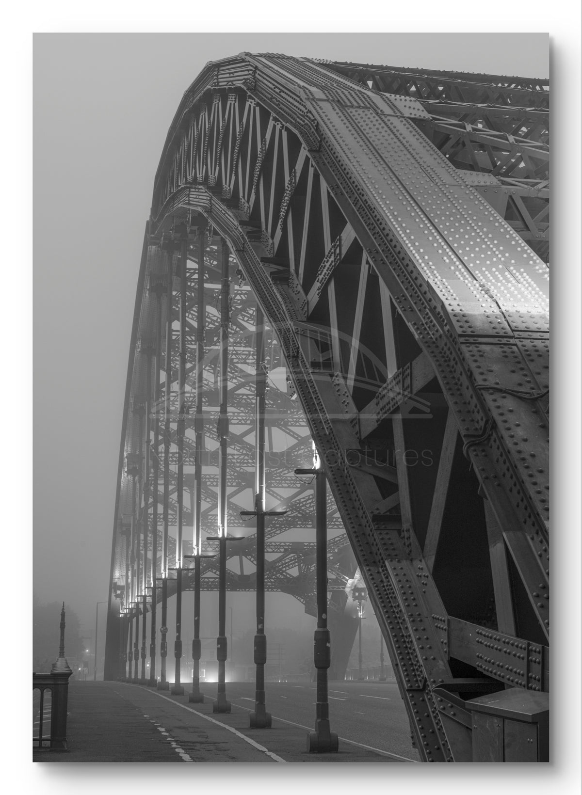 Wearmouth Bridge - Fog - Sunderland shown as a canvas print.