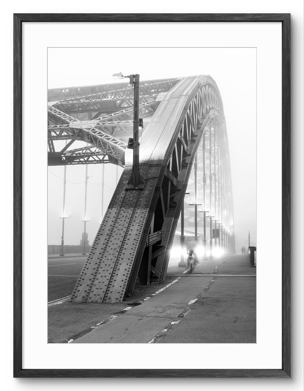 Wearmouth Bridge Surrounded By Fog - Sunderland shown as a framed photographic print.