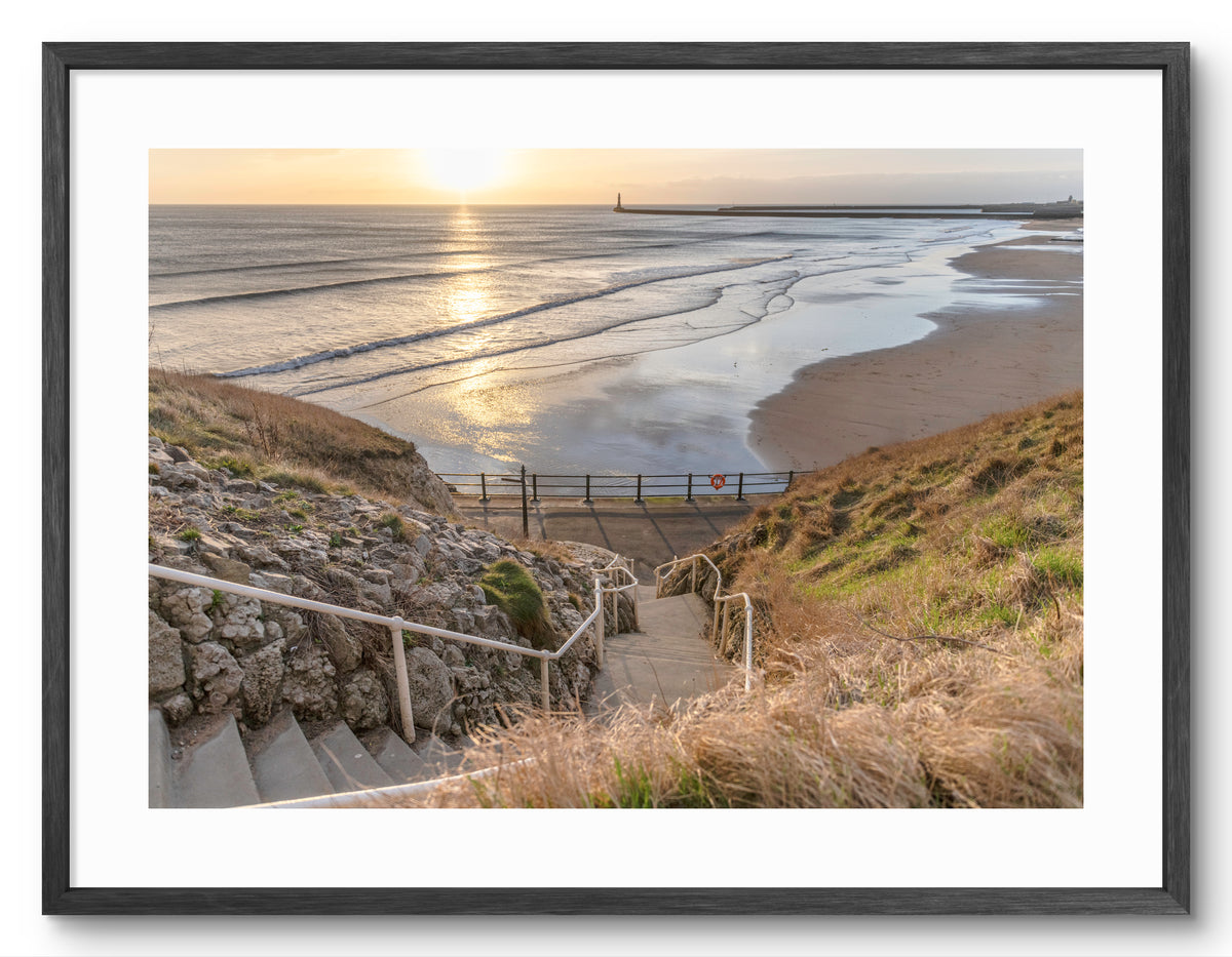 Cat and Dog Steps at Roker Beach in Sunderland shown as a framed photographic print.