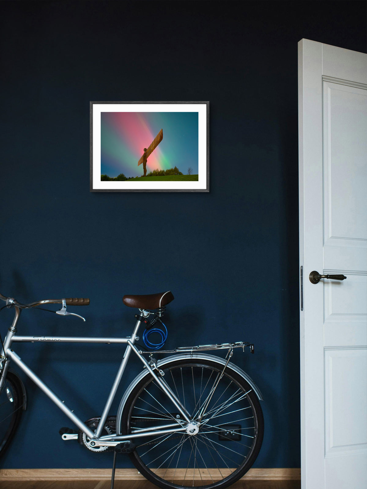 The Angel of the North Aurora - Northern Lights - Gateshead wall art displayed in a styled room setting.