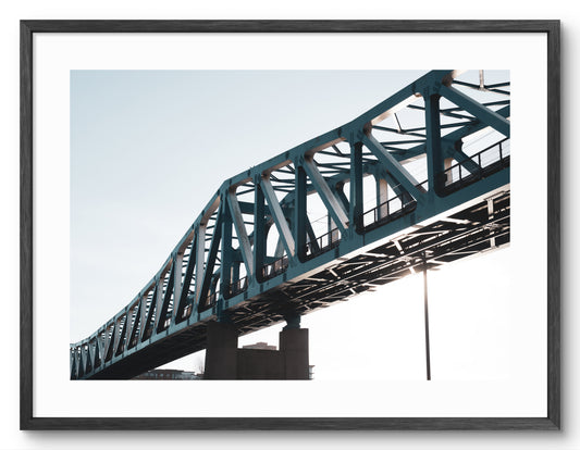 Queen Elizabeth II Metro Bridge - Newcastle Gateshead - River Tyne shown as a framed photographic print.
