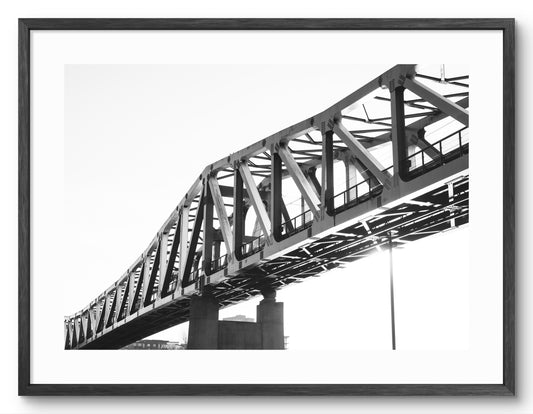 Queen Elizabeth II Metro Bridge - Newcastle Gateshead - Black and White shown as a framed photographic print.