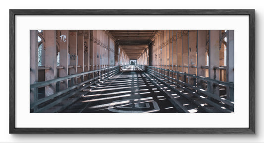 Under the High Level Bridge panoramic print — black frame and white mount