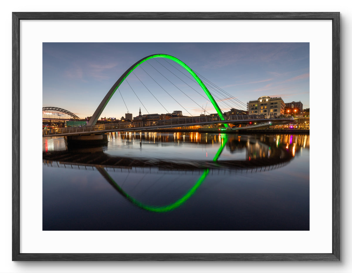 Millennium Bridge Gateshead - St Patrick's Day - Newcastle shown as a framed photographic print.