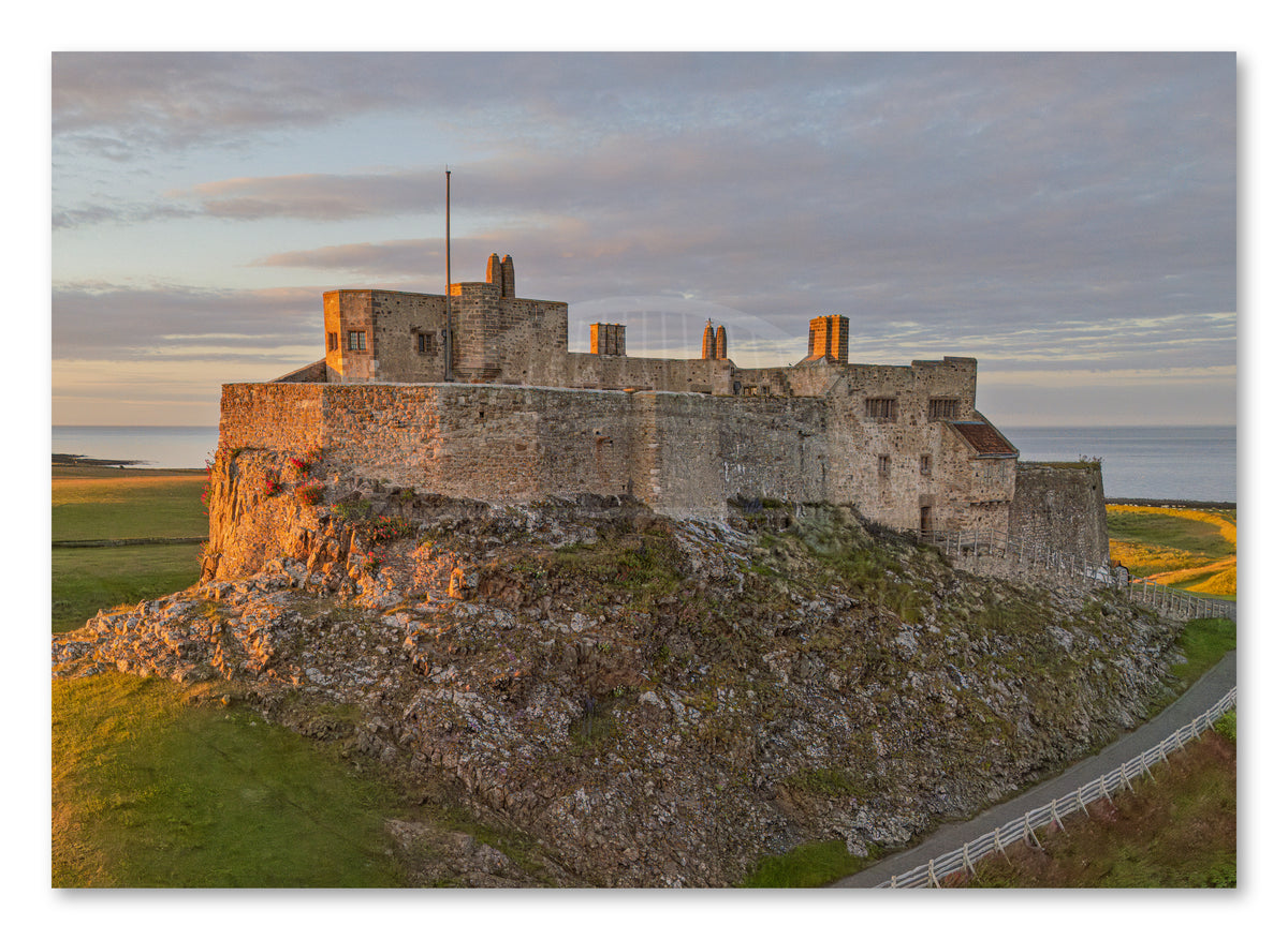 Lindisfarne Castle Sunset Print | Northumberland Wall Art shown as a canvas print.