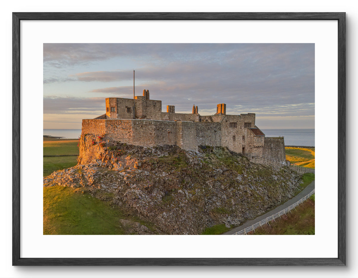Lindisfarne Castle Sunset Print | Northumberland Wall Art shown as a framed photographic print.