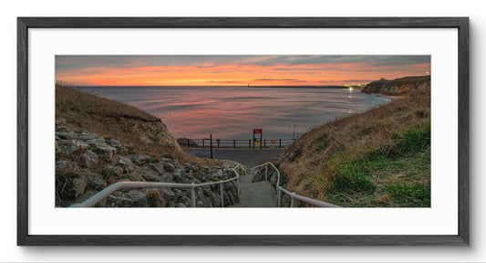King Edward’s Bay at Sunset panoramic print — black frame and white mount