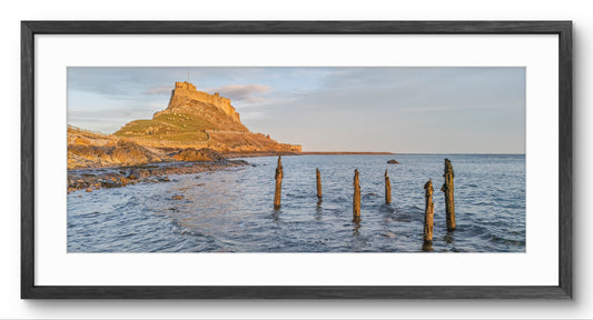 Lindisfarne Castle & Shore panoramic print — black frame and white mount
