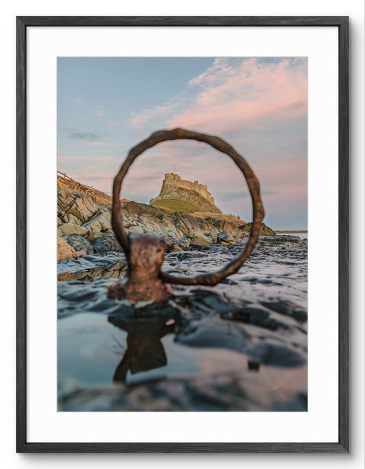 Lindisfarne Castle Through the Mooring Ring | Holy Island Print shown as a framed photographic print.