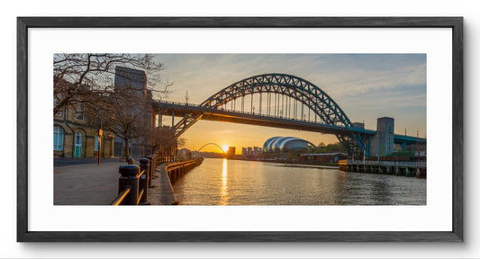 Tyne Bridge at Sunset Panoramic Framed Print — black frame and white mount