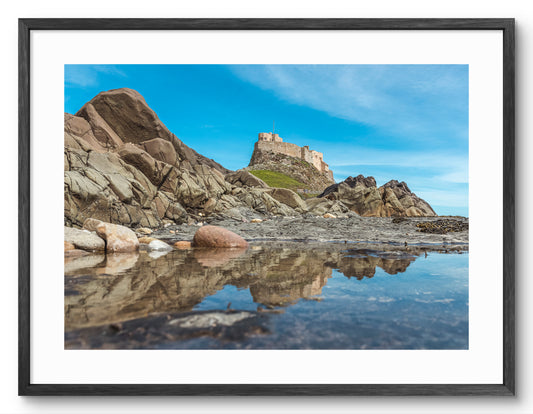 Lindisfarne Castle - Rock Pool Reflections - Holy Island - Northumberland shown as a framed photographic print.