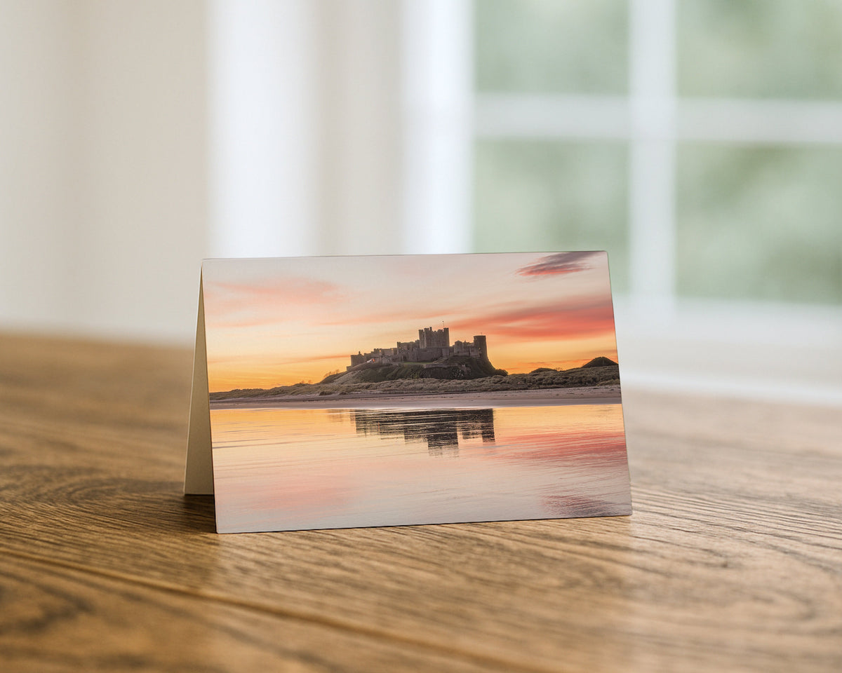 Bamburgh Castle Sunrise Reflections blank A5 greetings card, Northumberland, by North East Captures