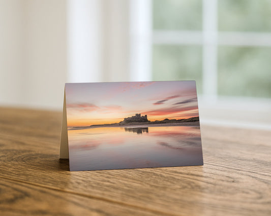 Bamburgh Castle Sunrise Across the Shore blank A5 greetings card, Northumberland, by North East Captures