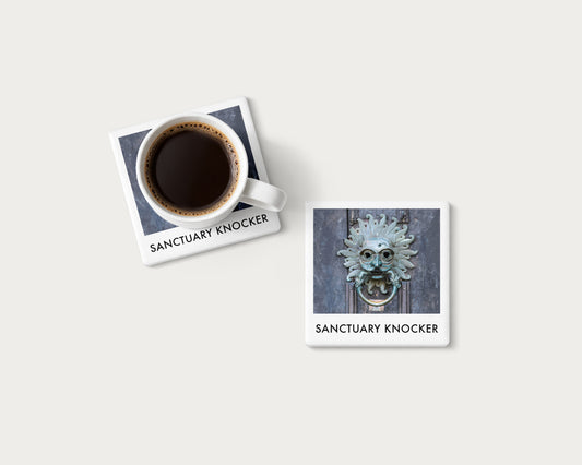 Illustrated ceramic coaster showing the Sanctuary Knocker on Durham Cathedral door; mockup with a coffee mug.