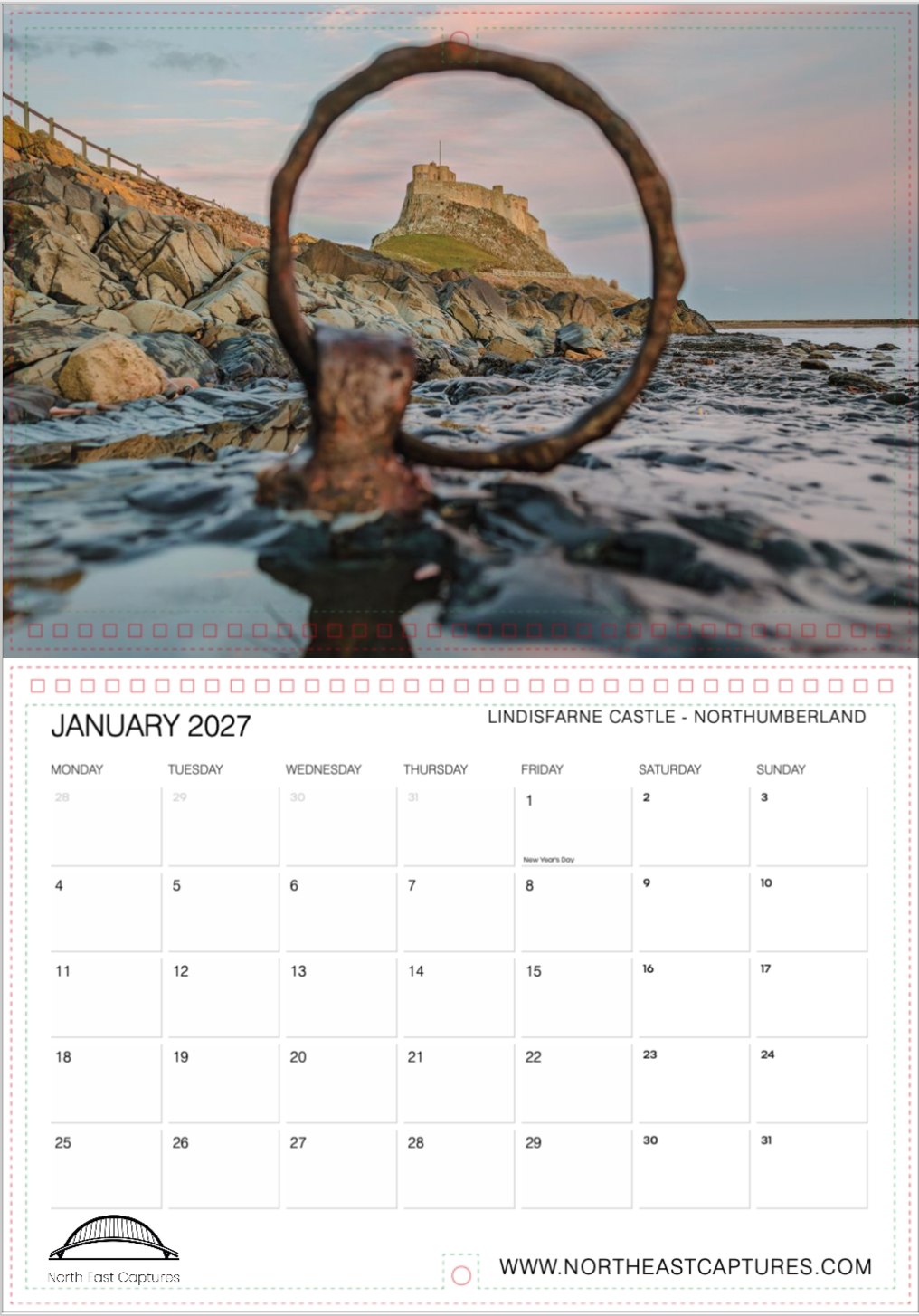 A January 2027 calendar page featuring a photograph of Lindisfarne Castle and rocky shoreline, with a large blurred ring in the foreground and a printed calendar grid below.
