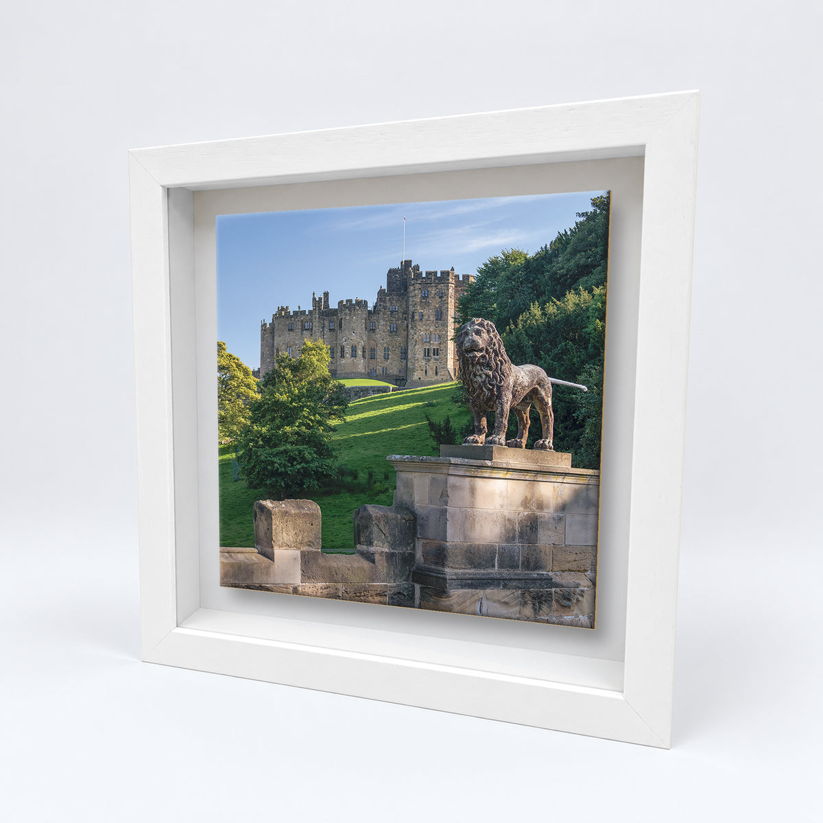 Alnwick Castle ceramic tile in a white solid wood box frame, angled view