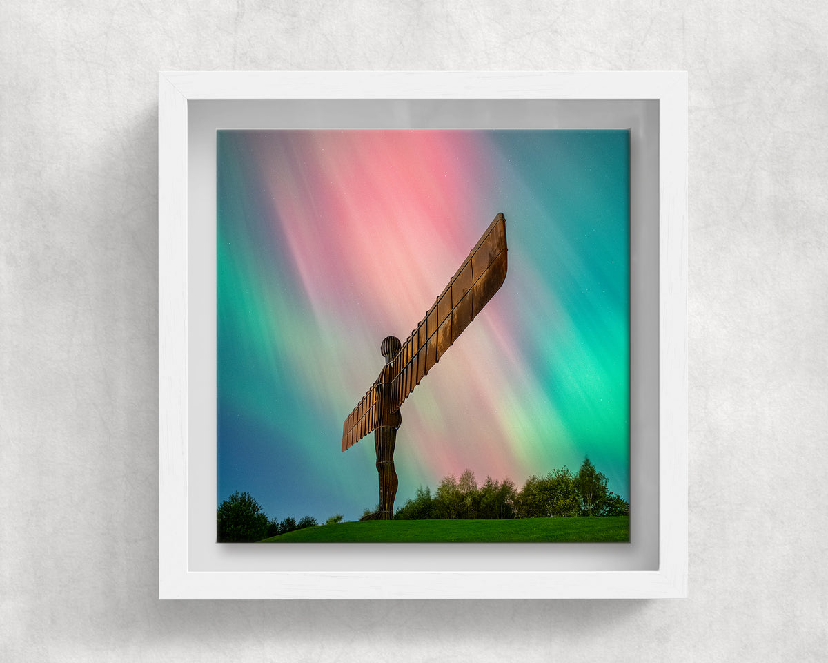 Angel of the North Northern Lights on an 8×8 inch ceramic tile in a white box frame, front view