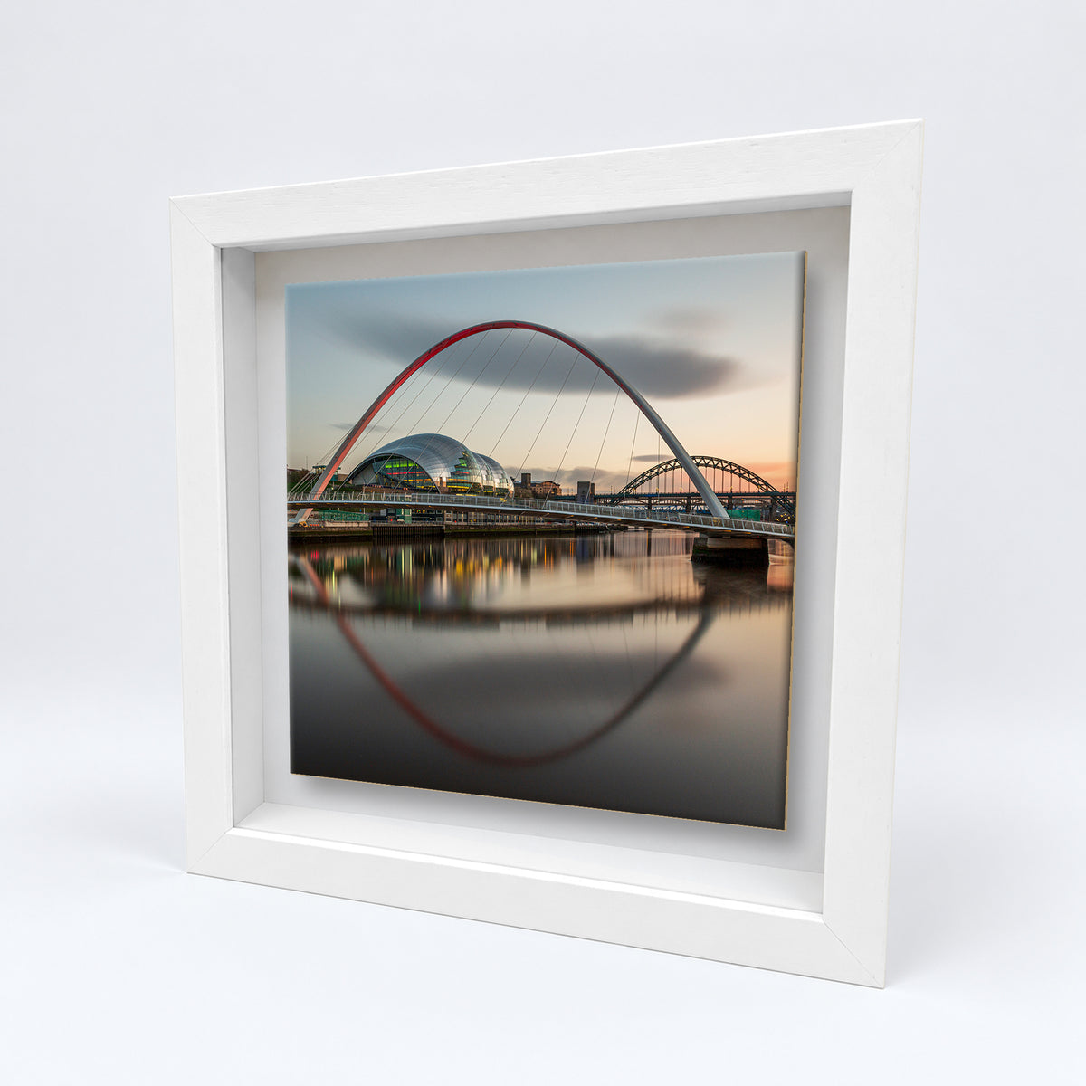 Gateshead Millennium Bridge on an 8×8 inch ceramic tile in a white box frame, angled view