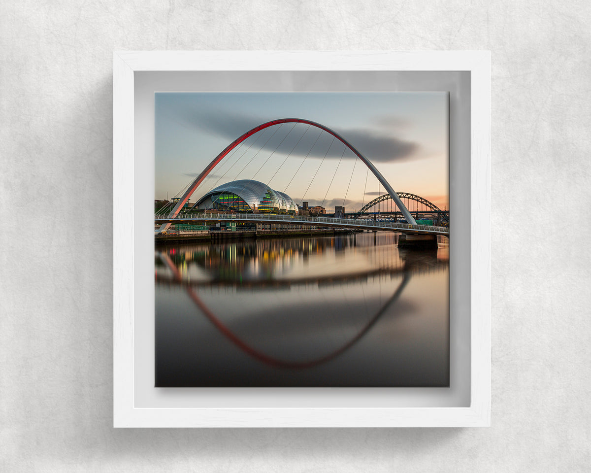 Gateshead Millennium Bridge on an 8×8 inch ceramic tile in a white box frame, front view