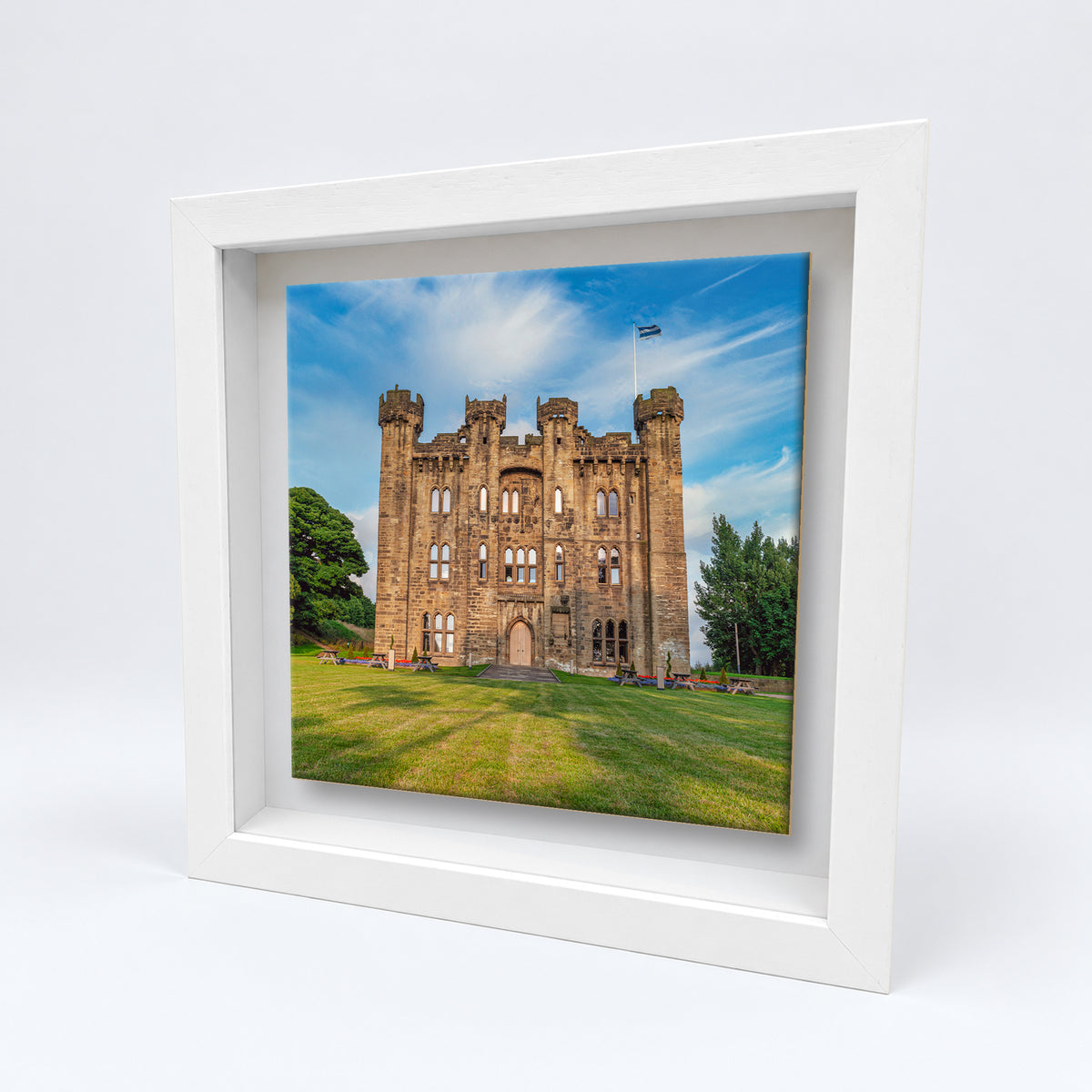 Hylton Castle on an 8×8 inch ceramic tile in a white box frame, angled view