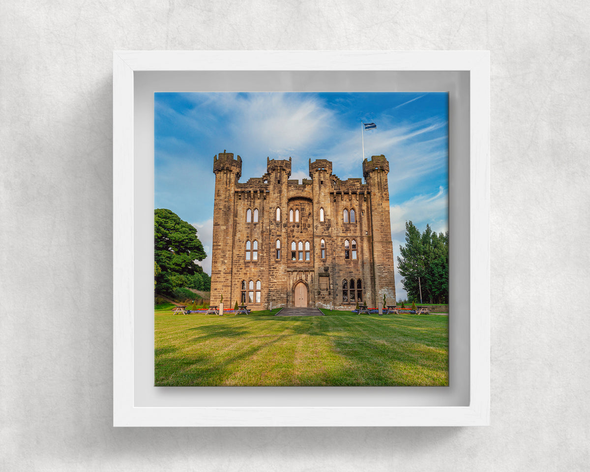 Hylton Castle on an 8×8 inch ceramic tile in a white box frame, front view