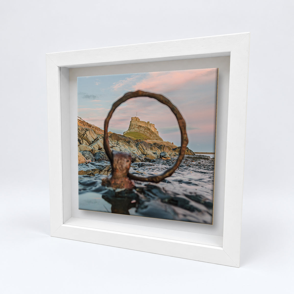 Lindisfarne Castle Mooring Ring on an 8×8 inch ceramic tile in a white box frame, angled view