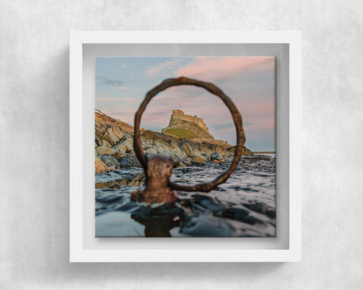 Lindisfarne Castle Mooring Ring on an 8×8 inch ceramic tile in a white box frame, front view