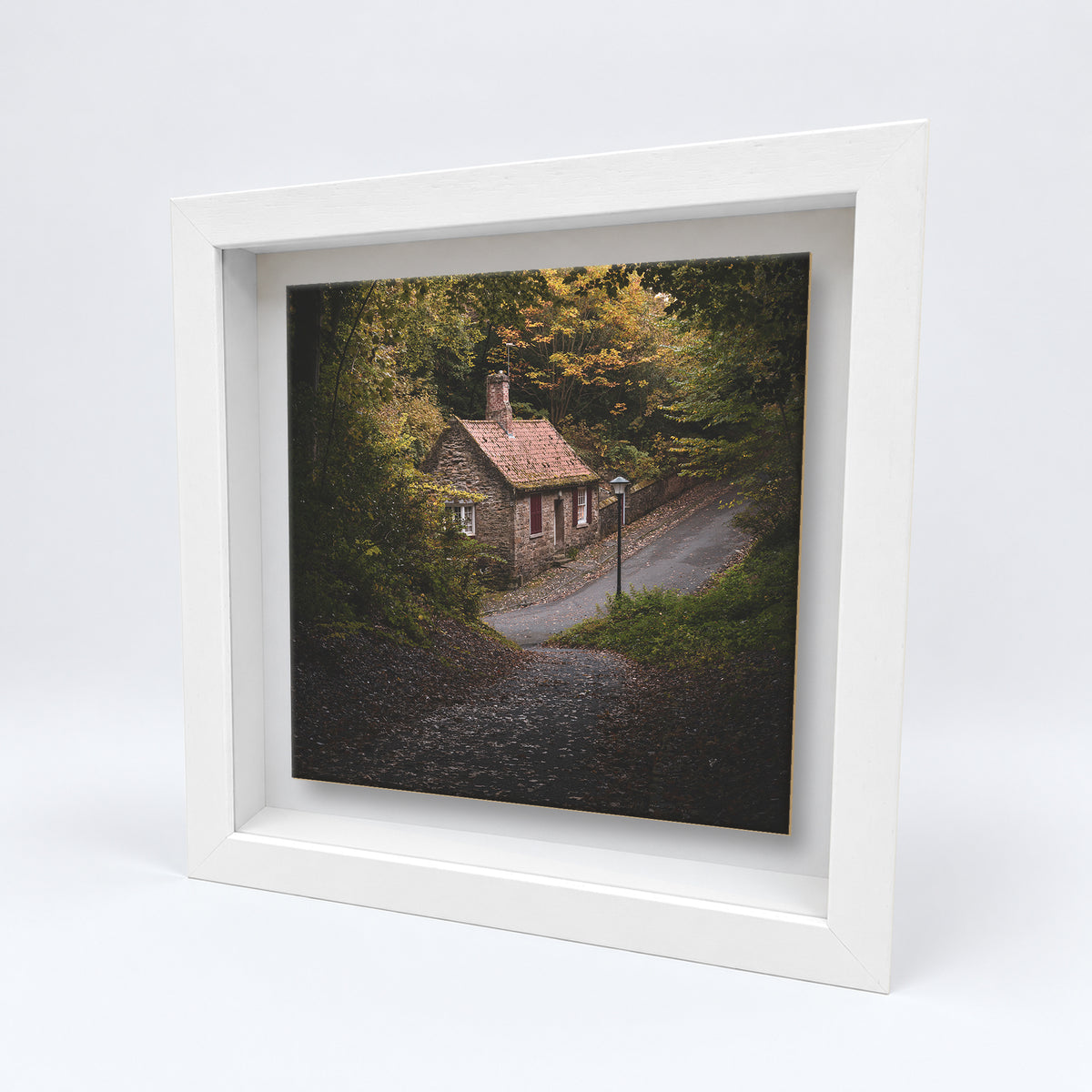 Prebends Cottage Durham on an 8×8 inch ceramic tile in a white box frame, angled view