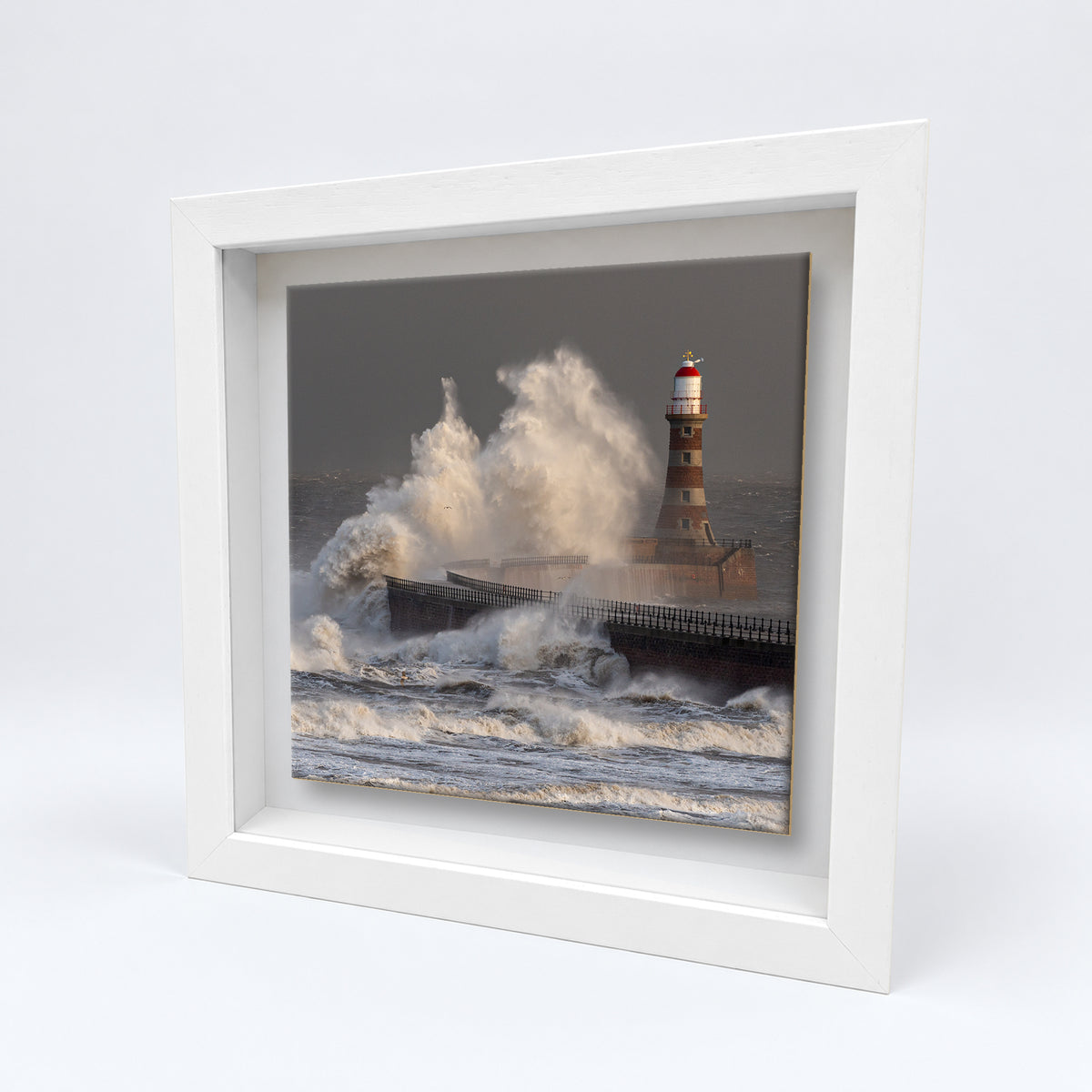 Roker Lighthouse Storm Waves on an 8×8 inch ceramic tile in a white box frame, angled view