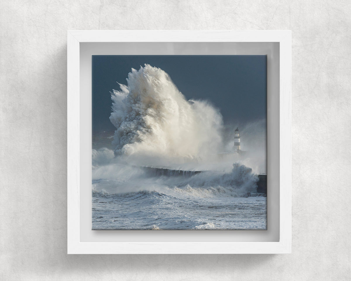 Seaham Lighthouse Breaking Wave on an 8×8 inch ceramic tile in a white box frame, front view