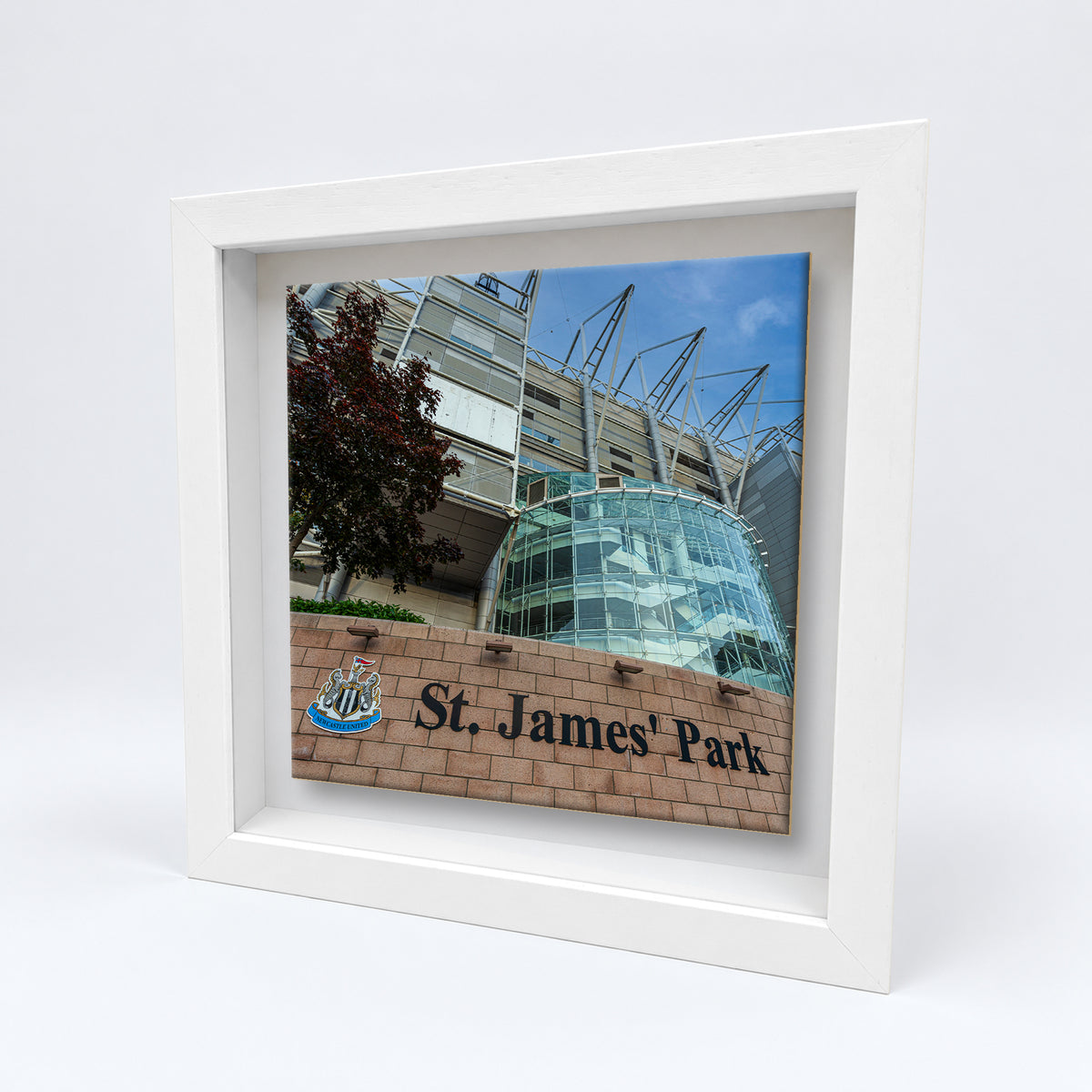 St James' Park Entrance on an 8×8 inch ceramic tile in a white box frame, angled view