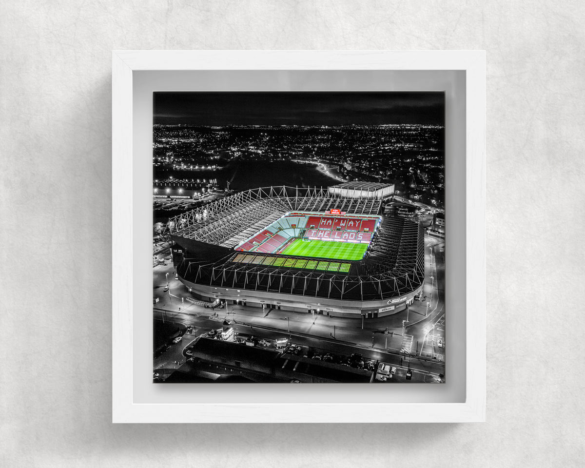 Stadium of Light at Night on an 8×8 inch ceramic tile in a white box frame, front view