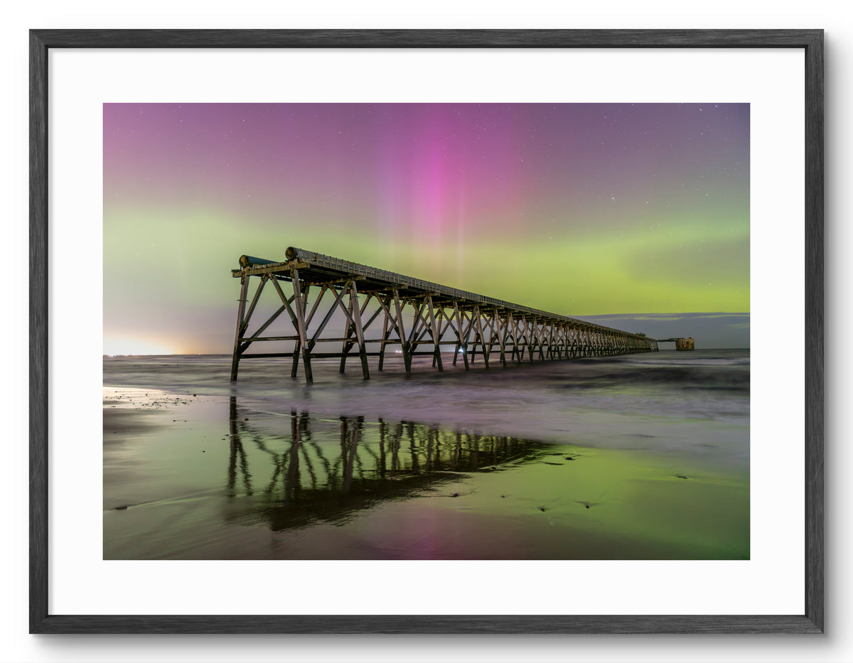 Steetley Pier Northern Lights Reflections — black frame with white mount