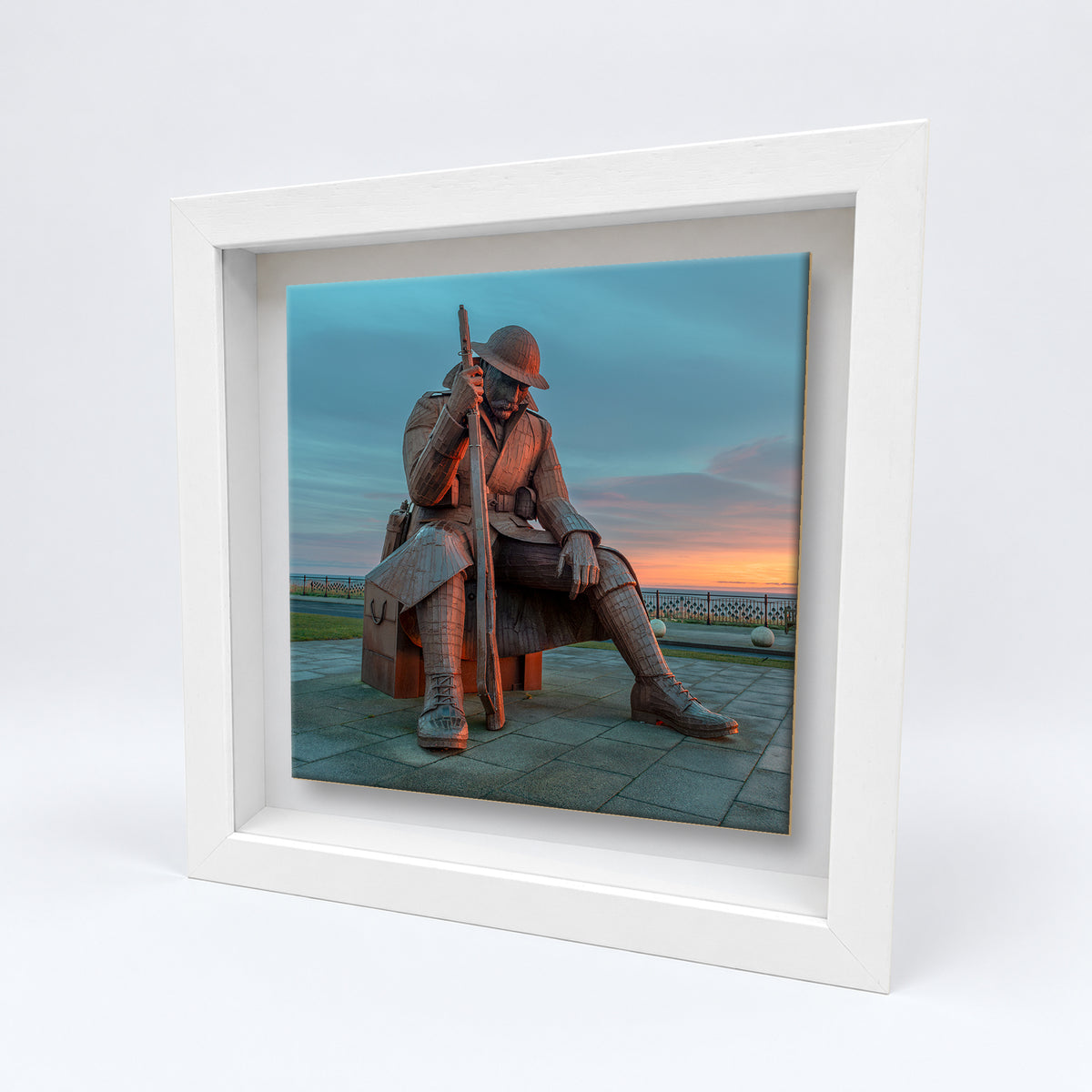 Tommy Seaham Blue Sky on an 8×8 inch ceramic tile in a white box frame, angled view