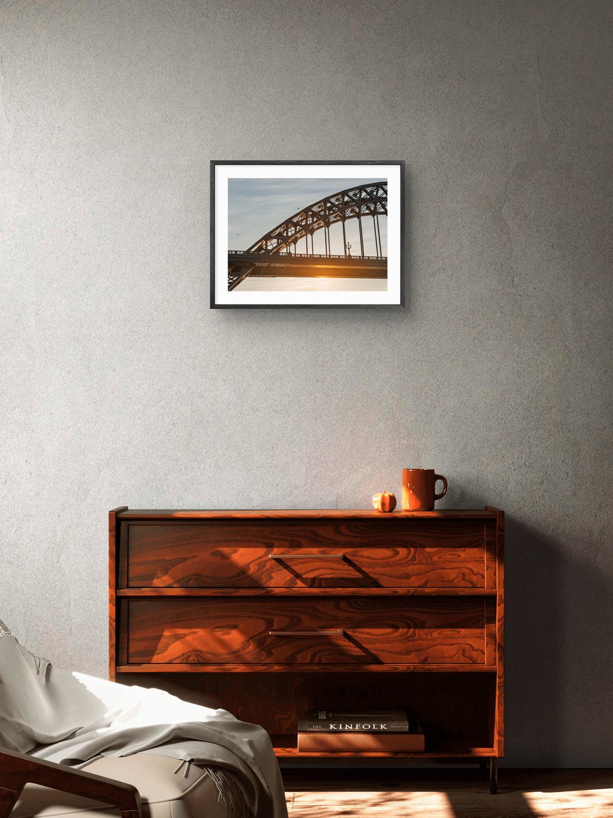 Tyne Bridge Arch at Sunrise — framed artwork shown in a room