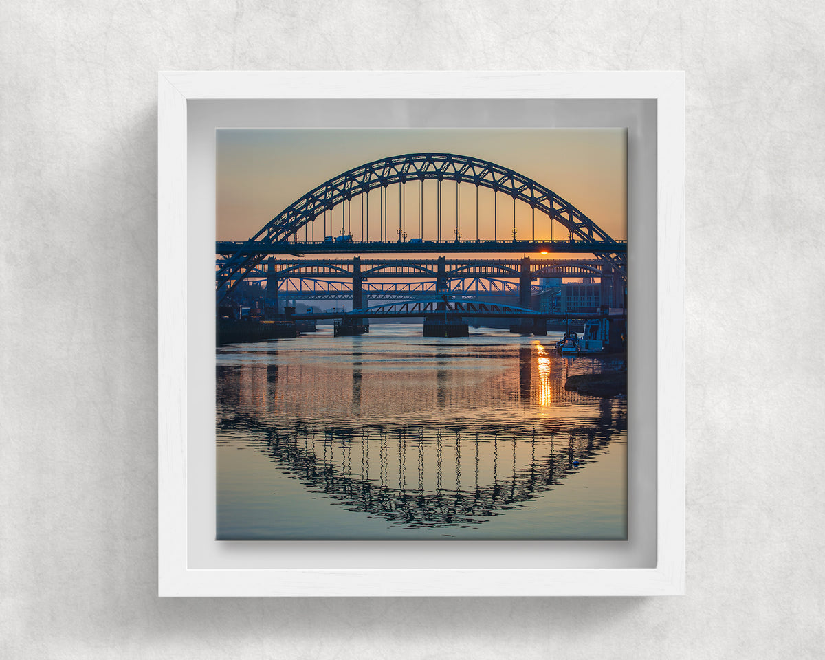 Tyne Bridges Reflections on an 8×8 inch ceramic tile in a white box frame, front view