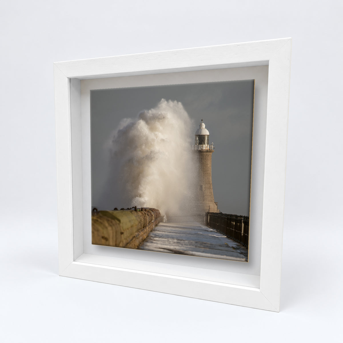 Tynemouth Lighthouse Storm Waves on an 8×8 inch ceramic tile in a white box frame, angled view