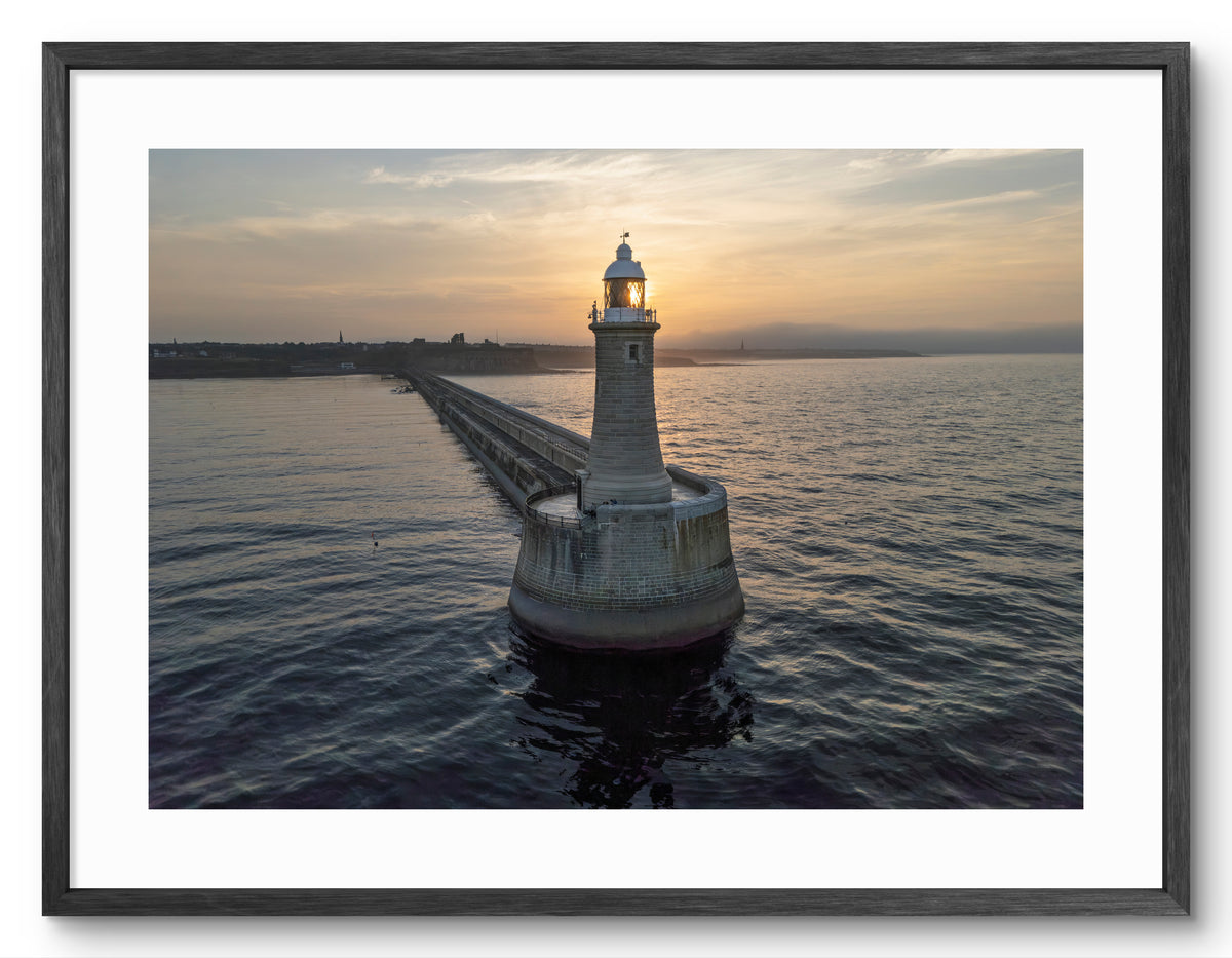 Tynemouth Pier Lighthouse Sunset Landscape — black frame with white mount