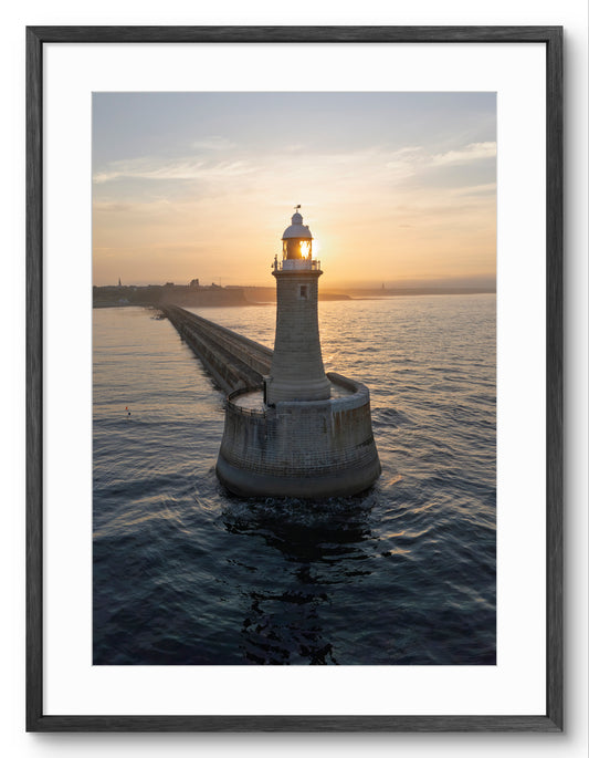 Tynemouth Pier Lighthouse Sunset Portrait — black frame with white mount