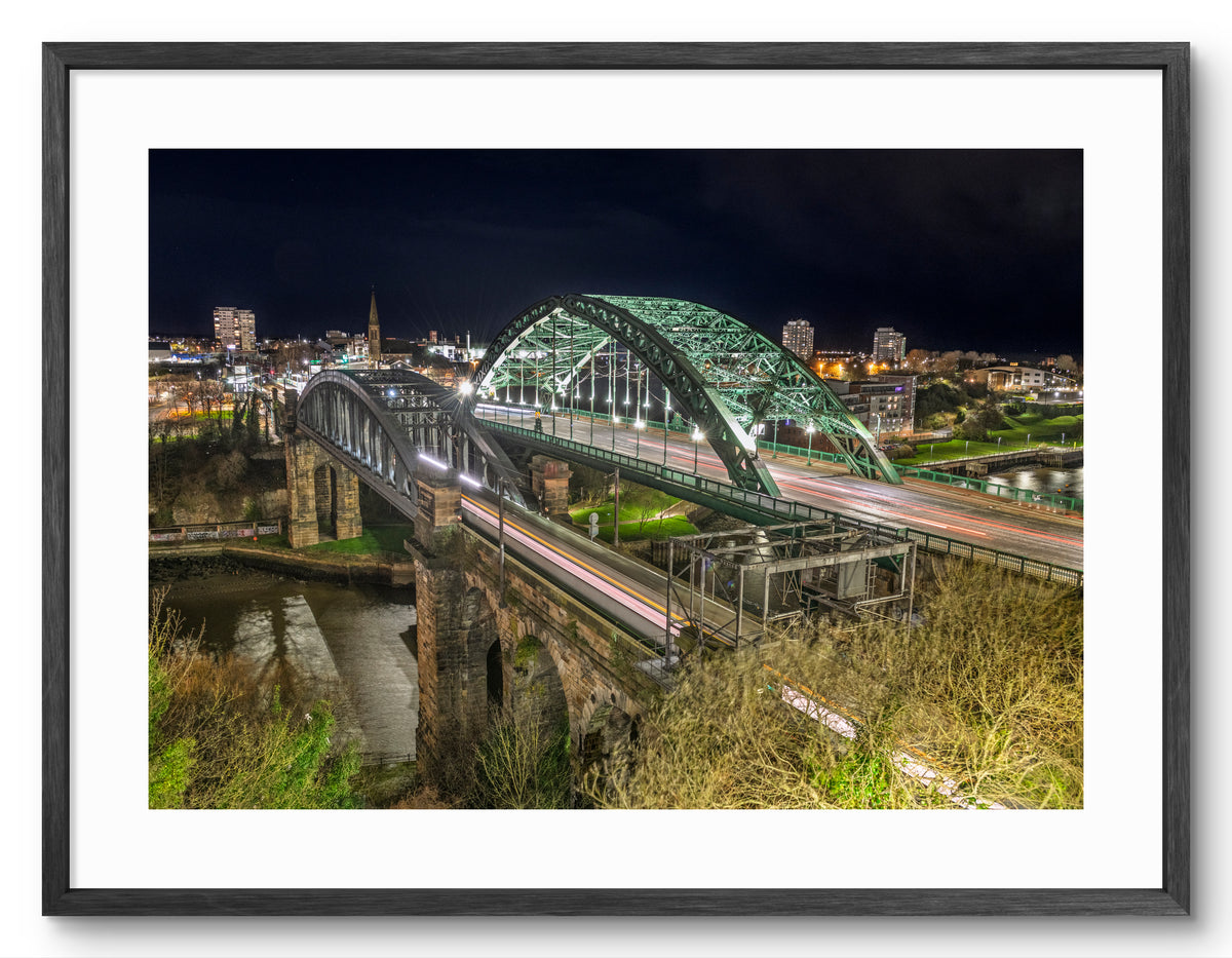 Wearmouth Bridges at Night — black frame with white mount