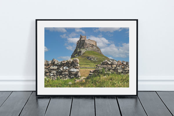 Lindisfarne Castle framed by Stone Wall on Holy Island, Northumberland