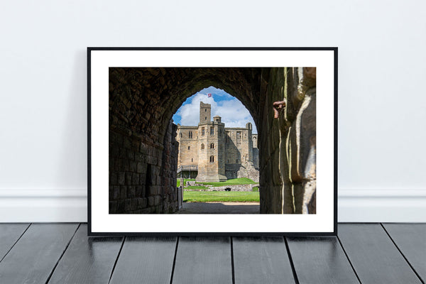 Warkworth Castle keep seen through The Great Gate Tower. Located in the English county of Northumberland. - North East Captures