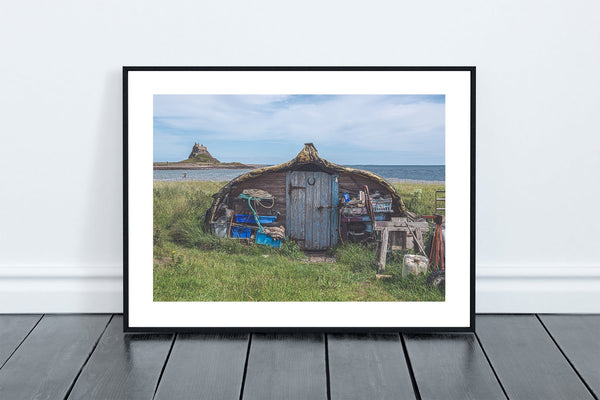 Upturned Boat Shed on Holy Island with Lindisfarne Castle in the background, Northumberland, England - North East Captures